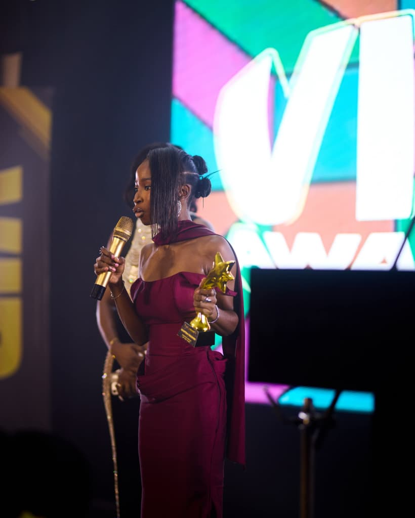 Classytoks Makeovers founder giving her acceptance speech on stage with the award
